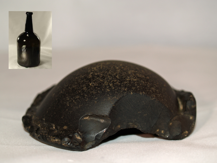 An 18th Century black blown glass mallet bottle found in Bradiford Water